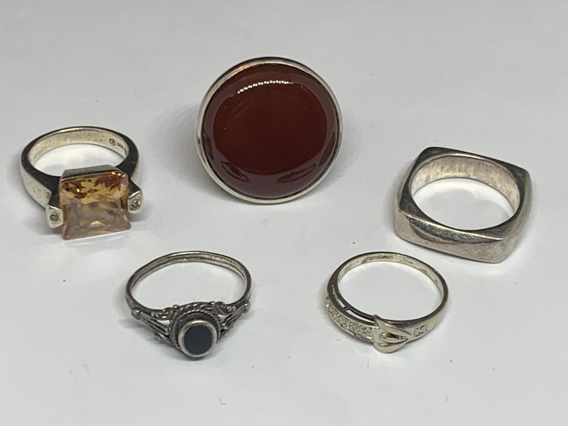 FIVE VARIOUS SILVER RINGS