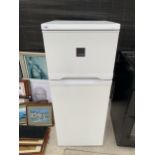 A WHITE ZANUSSI UPRIGHT FRIDGE FREEZER