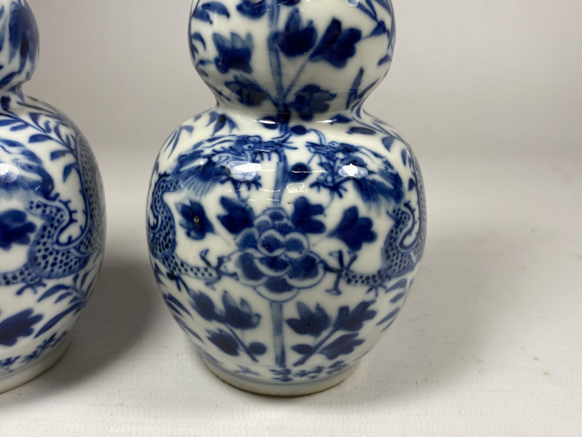 A PAIR OF QING 19TH CENTURY CHINESE BLUE AND WHITE KANGXI STYLE DOUBLE GOURD VASES, FOUR CHARACTER - Image 3 of 9