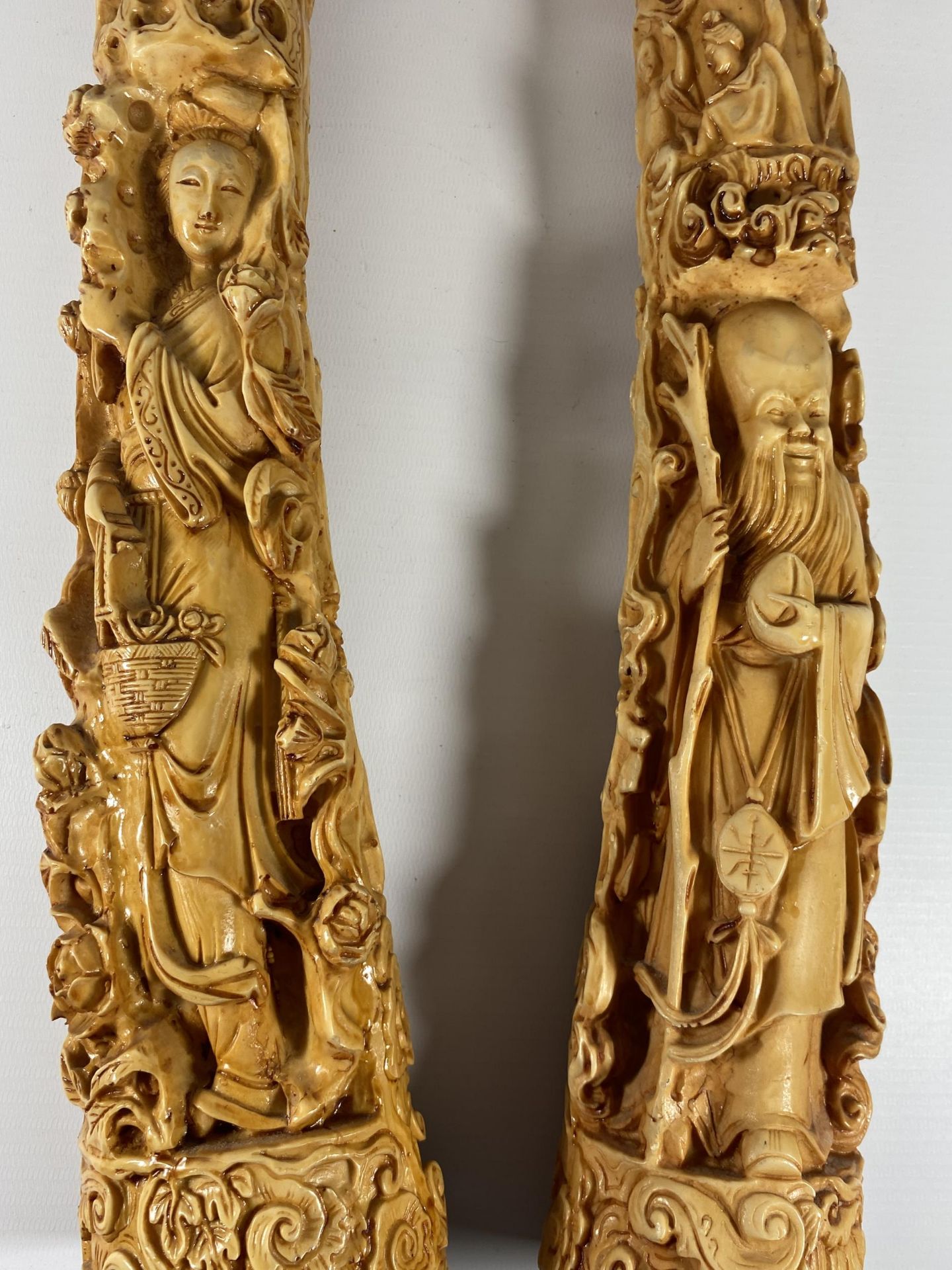 A PAIR OF LARGE RESIN ORIENTAL TUSKS, LENGTH 44CM - Image 2 of 3