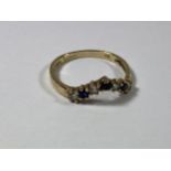 A 9CT GOLD WISHBONE SAPPHIRE & CZ RING, WEIGHT 1.2G