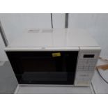 A WHITE AND BLACK HINARI LIFESTYKE MICROWAVE OVEN