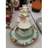 A ROYAL ALBERT 'PEPPERMINT DAMASK' TRIO PLUS FOUR IMPERIAL CHINA CUPS AND SAUCERS