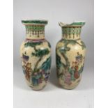TWO 19TH CENTURY CHINESE CRACKLE GLAZE PORCELAIN WARRIOR DESIGN VASES, HEIGHT 25.5CM (A/F)