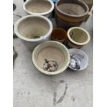 AN ASSORTMENT OF VARIOUS GLAZED PLANTERS