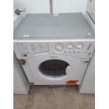 A WHITE HOTPOINT INTERGRATED WASHING MACHINE