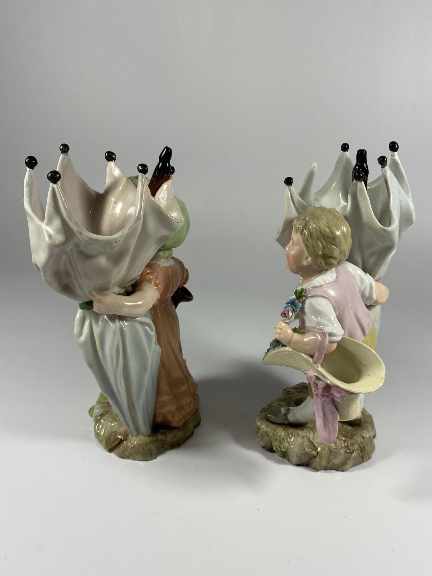 A PAIR OF 19TH CENTURY DRESDEN STYLE CONTINENTAL HARD PASTE PORCELAIN FIGURES WITH CROSSED SWORD - Image 3 of 4