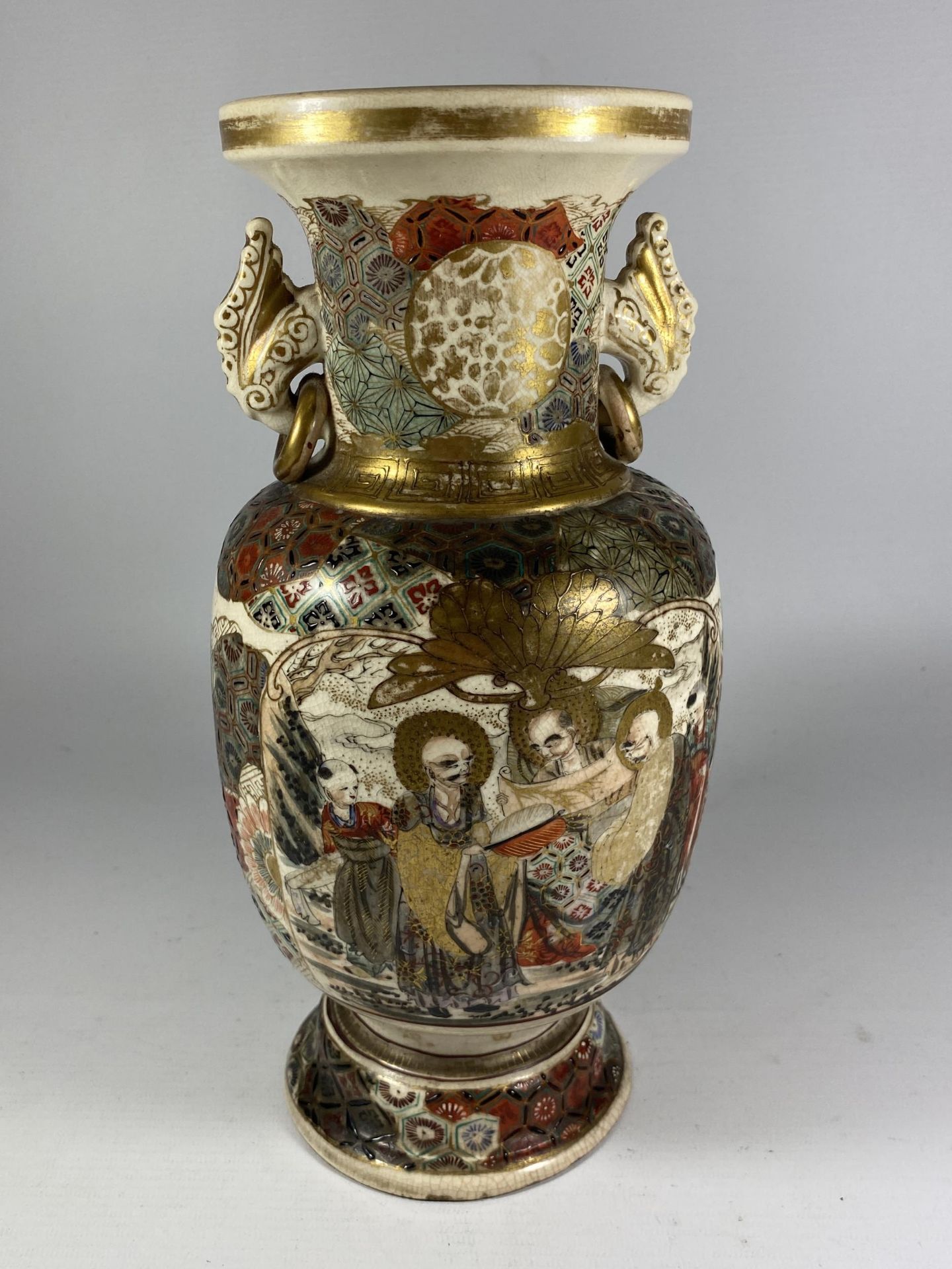 A JAPANESE MEIJI PERIOD (1868-1912) SATSUMA POTTERY TWIN HANDLED VASE WITH FIGURAL SCHOLAR DESIGN,