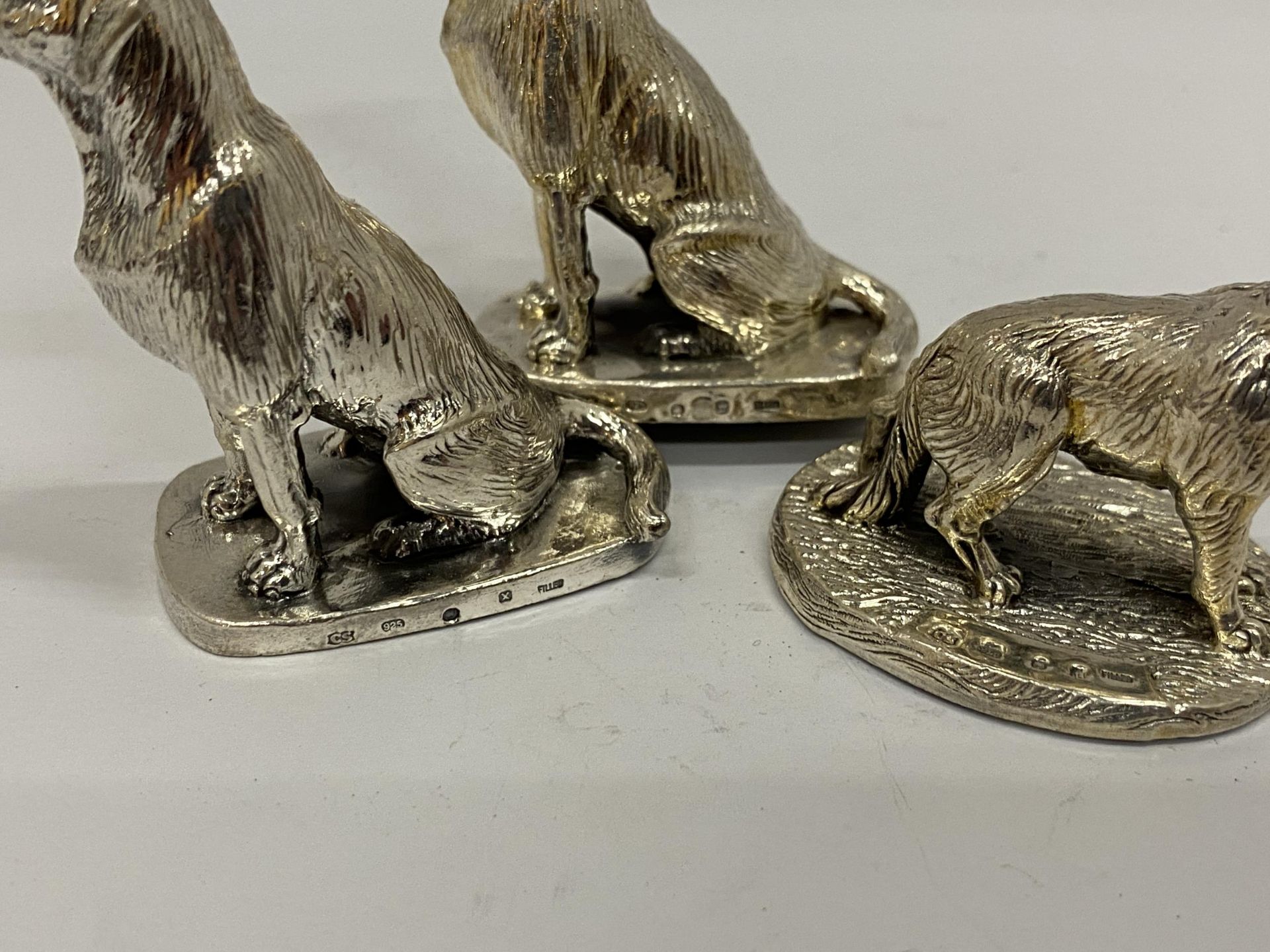 A GROUP OF THREE HALLMARKED SILVER FILLED CAMELOT SILVERWARE LTD DOG FIGURES - Image 2 of 4