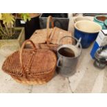 TWO WICKER BASKETS AND A GALVANISED WATERING CAN