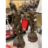 A PAIR OF EARLY 20TH CENTURY FRENCH BRONZED SPELTER FIGURES OF ART NOVEAU LADIES ON WOODEN STANDS