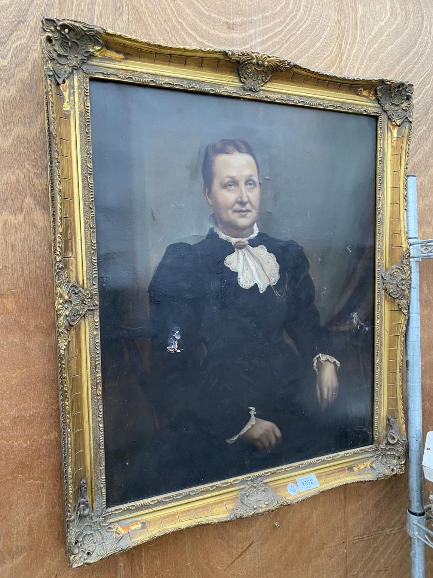 A FRAMED VICTORIAN OIL PAINTING OF A LADY