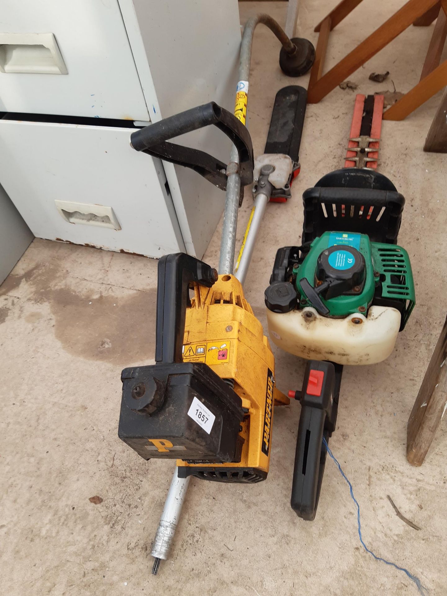 A PETROL ENGINE HEDGE TRIMMER, A GRASS STRIMMER AND A LONG REACH CHAINSAW ATTATCHMENT