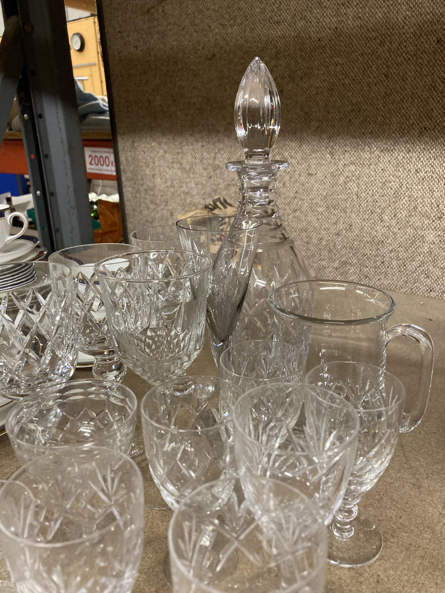 A QUANTITY OF GLASSWARE TO INCLUDE A DECANTER, JUG, WINE GLASSES, SHERRY GLASSES ETC., - Image 2 of 3