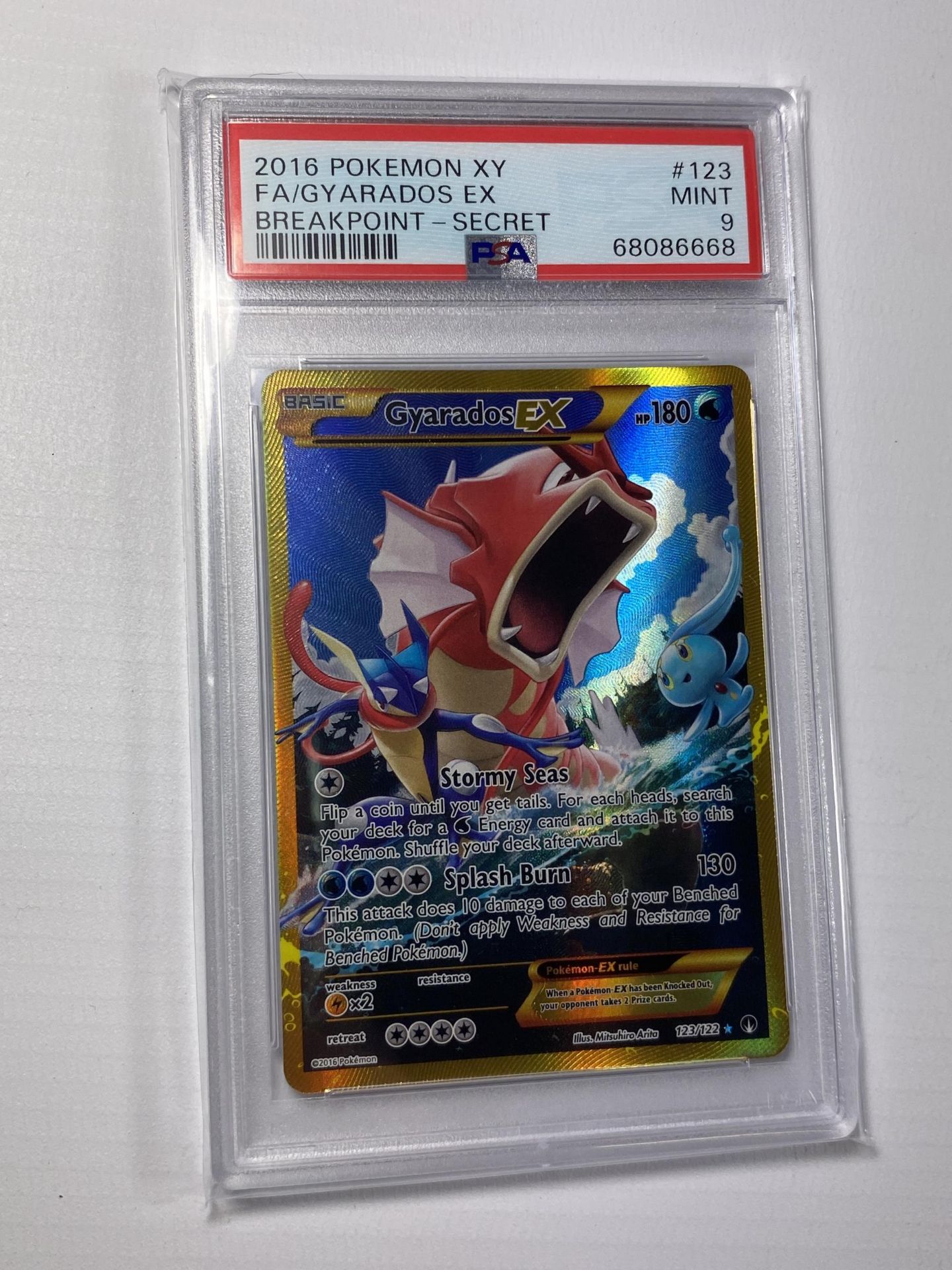 A PSA 2016 GYARADOS EX SECRET RARE 123/122 POKEMON CARD - GRADED 9