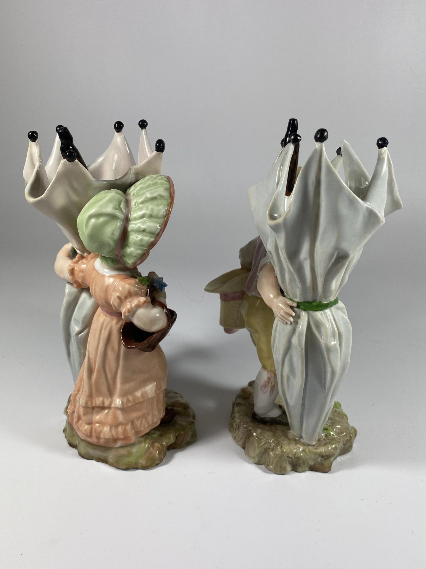 A PAIR OF 19TH CENTURY DRESDEN STYLE CONTINENTAL HARD PASTE PORCELAIN FIGURES WITH CROSSED SWORD - Image 2 of 4