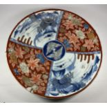 A LARGE JAPANESE IMARI CHARGER, DIAMETER 36CM, A/F