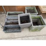 AN ASSORTMENT OF DECORATIVE PLANTERS AND WINDOW BOXES