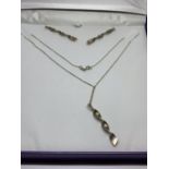 A SILVER NECKLACE AND EARRING SET IN A PRESENTATION BOX