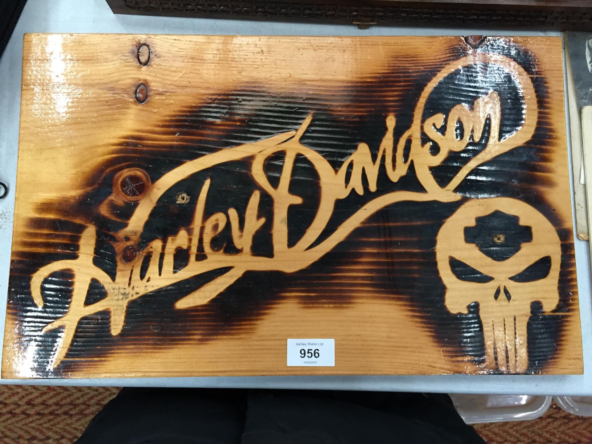 A WOODEN HARLEY DAVIDSON SIGN