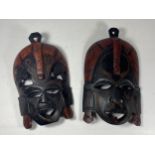 A PAIR OF VINTAGE AFRICAN TRIBAL MASKS, LENGTH 23CM