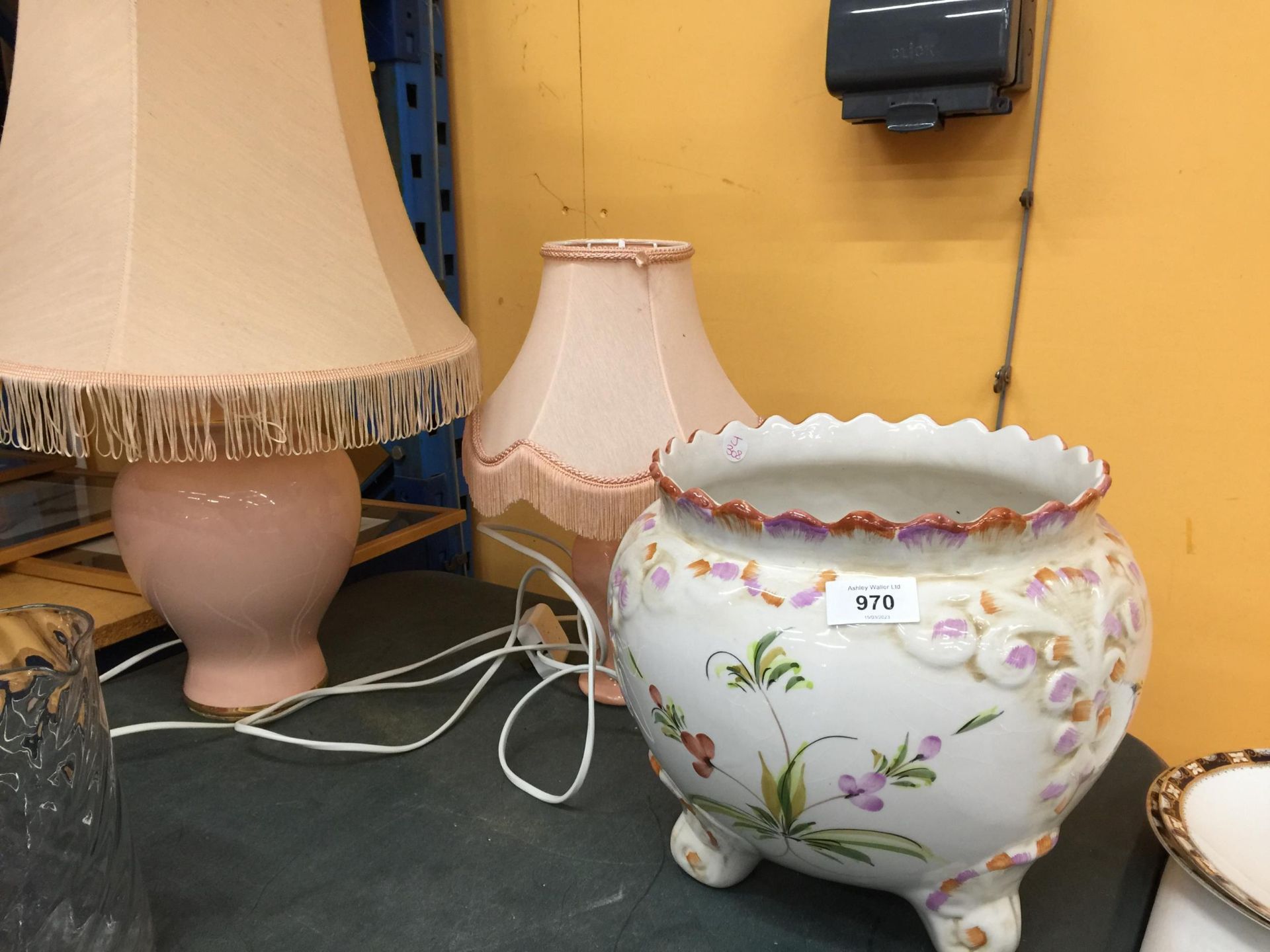 TWO PEACH COLOURED TABLE LAMPS WITH SHADES PLUS A LARGE FLORAL PLANTER
