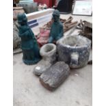 FIVE VARIOUS RECONSTITUTED STONE GARDEN FIGURES TO INCLUDE A BOOT AND A SEATED MAN ETC