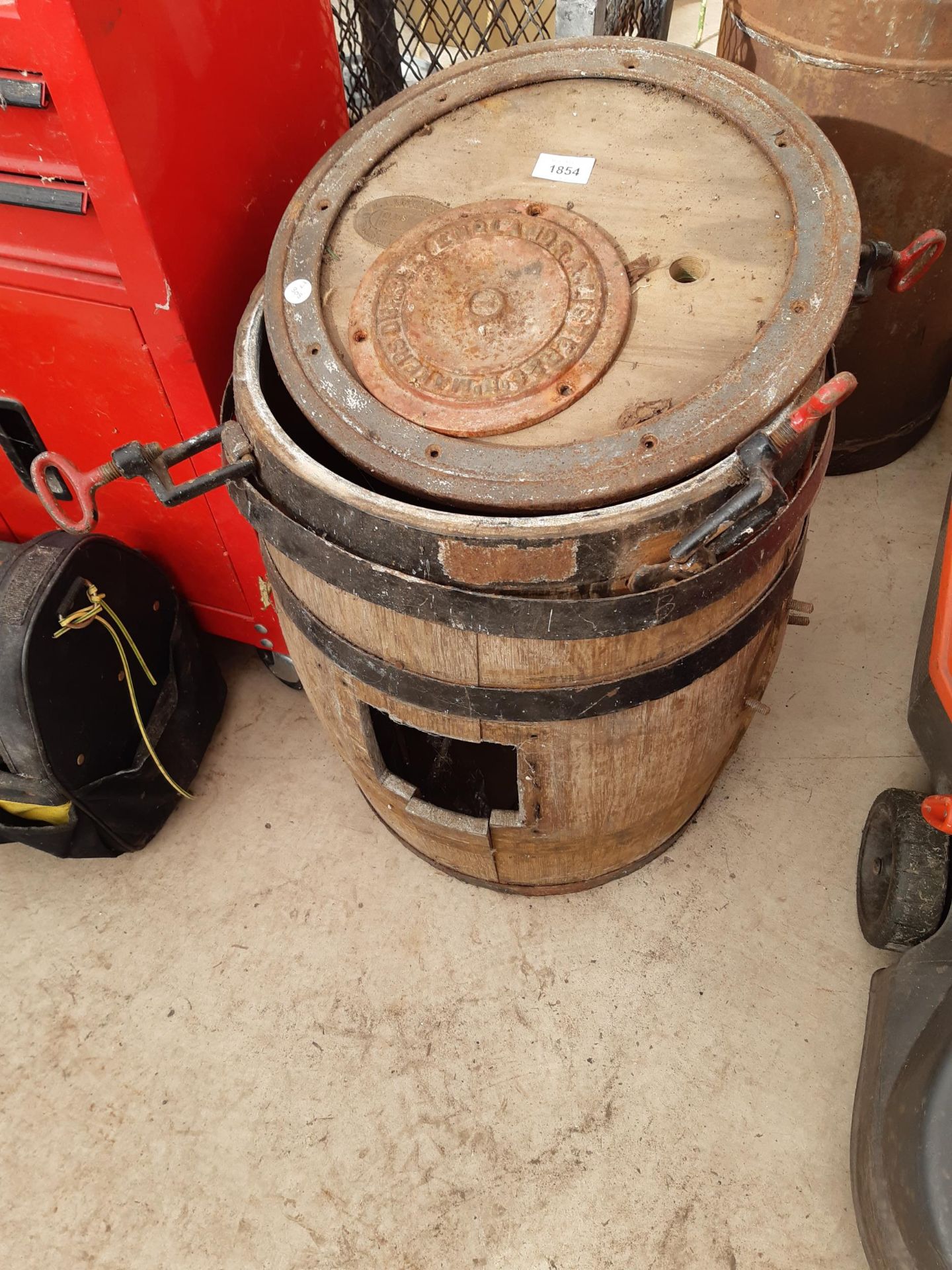 A VINTAGE WOODEN BUTTER CHURN