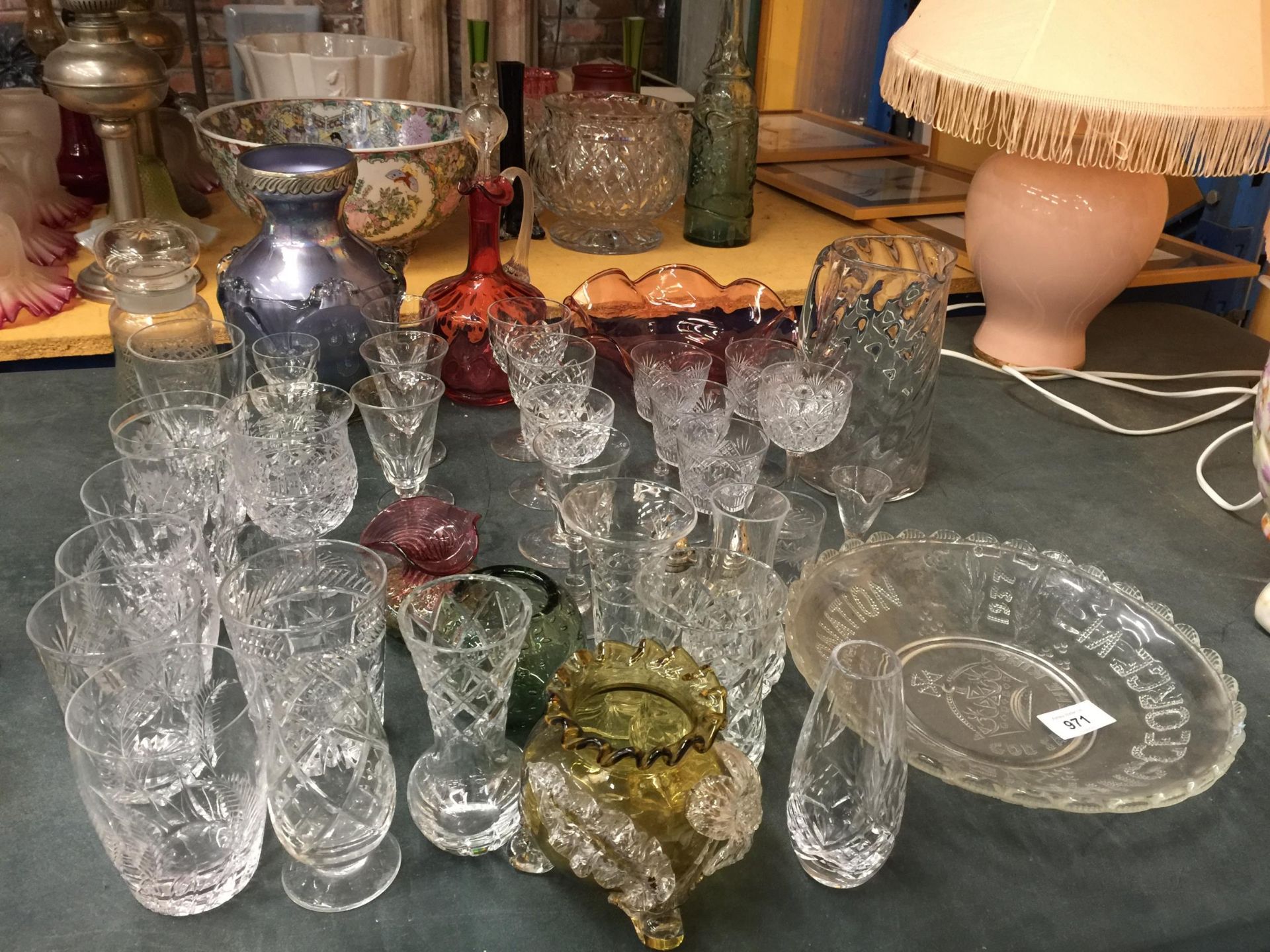 A LARGE QUANTITY OF GLASSWARE TO INCLUDE COLOURED EXAMPLES