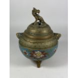 A CHINESE CLOISONNE AND BRASS LIDDED INCENSE BURNER ON TRIPOD BASE AND ANIMAL DESIGN FINIAL,