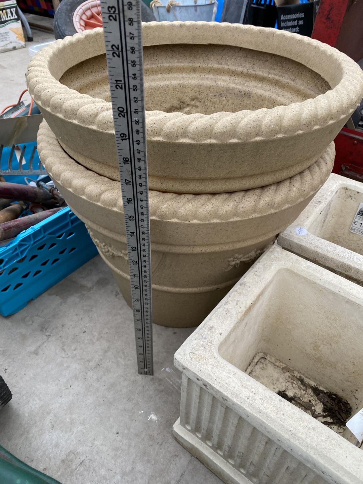 A PAIR OF SMALL RECONSTITUTED STONE PLANTERS AND A FURTHER PAIR OF ROUND PLASTIC PLANTERS - Image 3 of 4