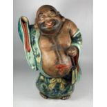 A LARGE JAPANESE MEIJI PERIOD (1868-1912) POTTERY MODEL OF HOTEI WEARING CHINESE DRAGON DESIGN ROBE,