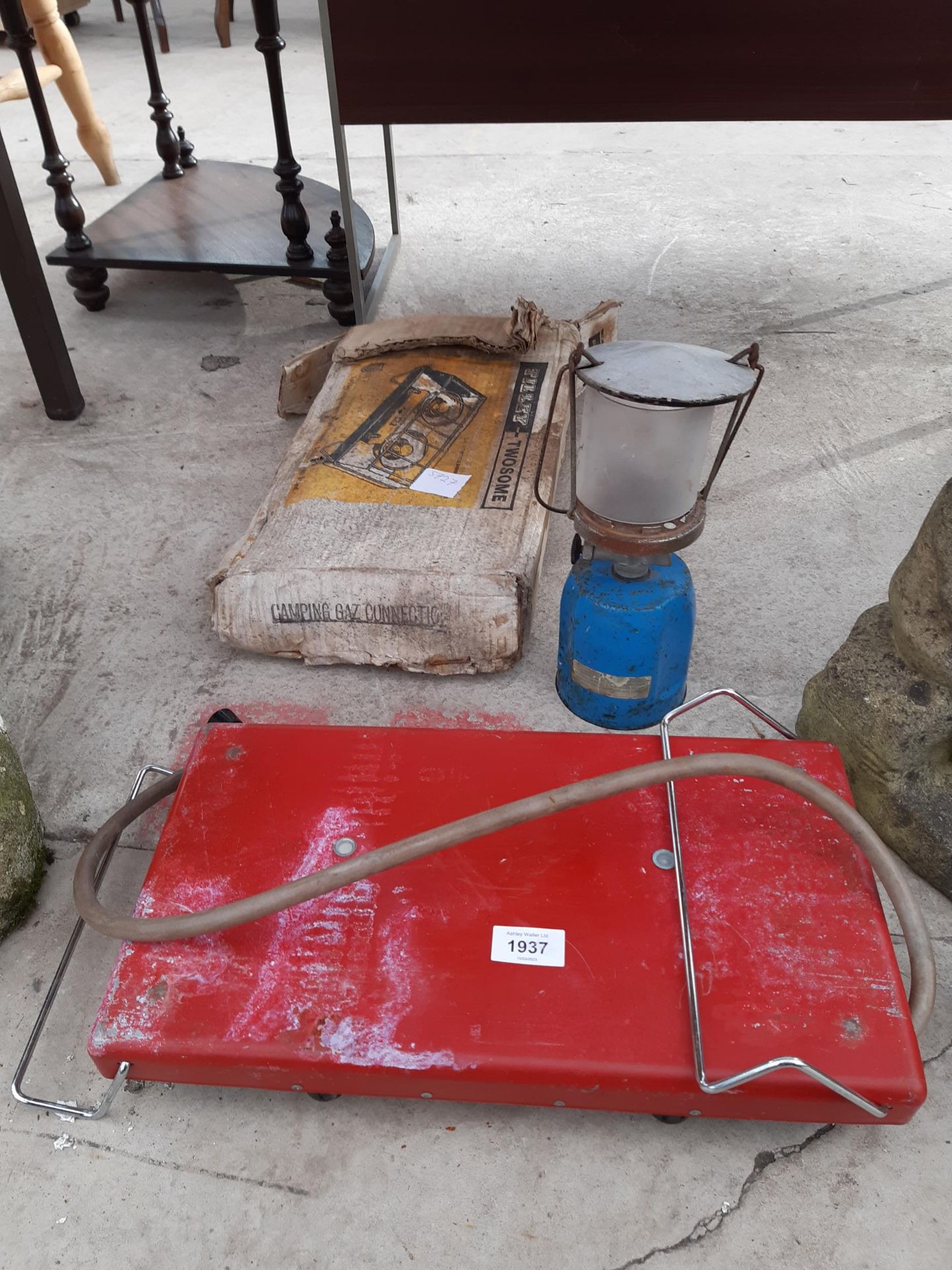 A TILLEY CAMPING STOVE AND A CAMPING LIGHT ETC
