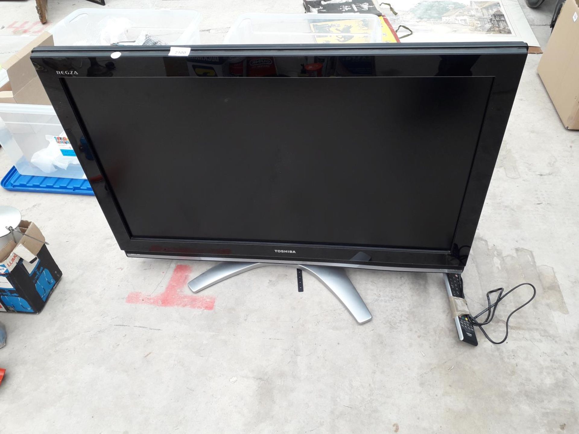 A TOSHIBA 37" TELEVISION WITH REMOTE CONTROL