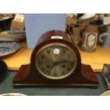A NELSONS HAT STYLE MAHOGANY MANTLE CLOCK