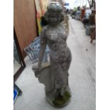 A RECONSTITUTED STONE FIGURE OF AN ART DECO FEMALE