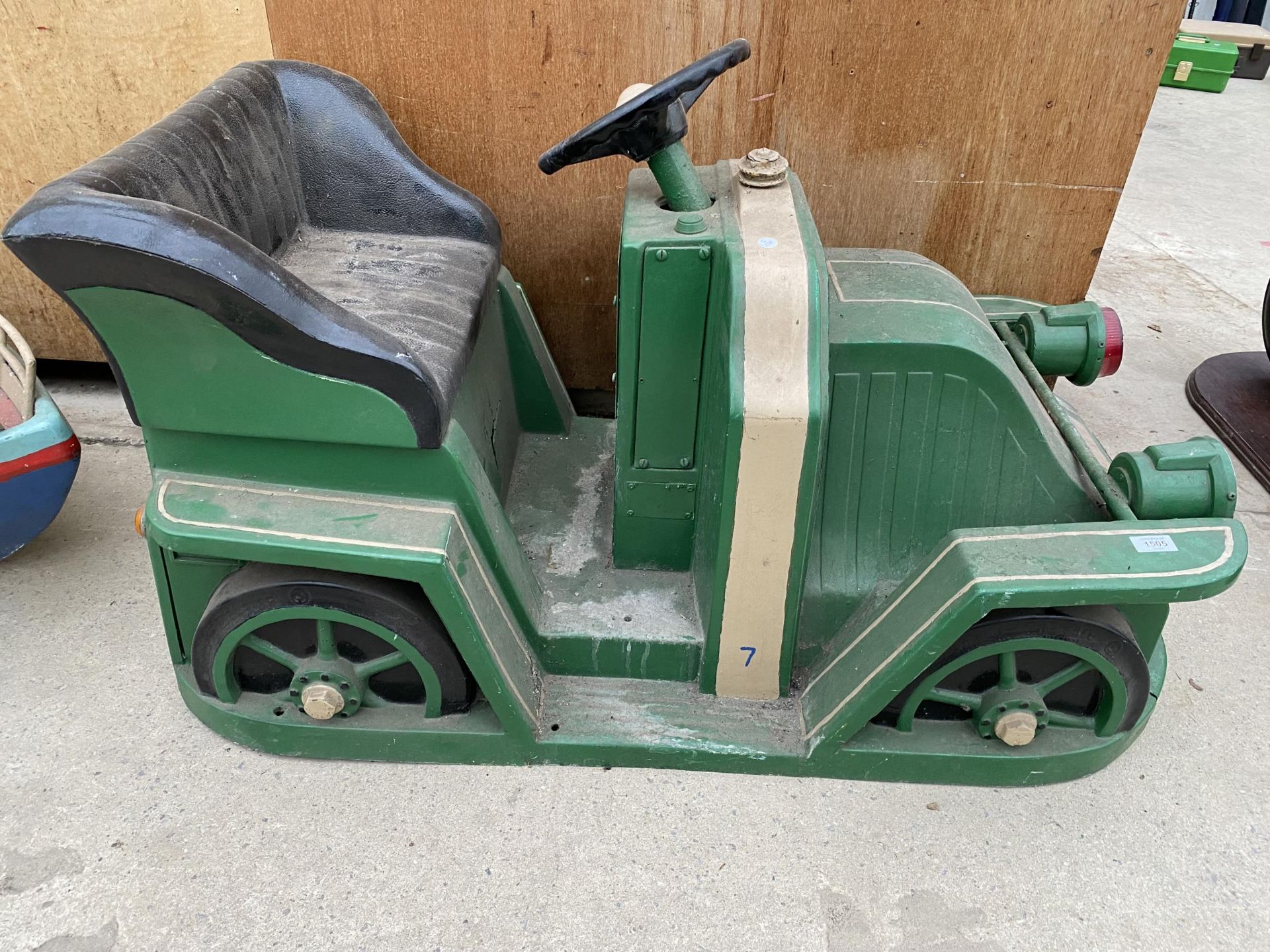 A VINTAGE RENULT CAR FAIRGROUND RIDE