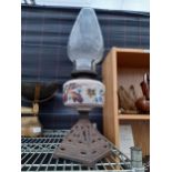 A VINTAGE METAL OIL LAMP COMPLETE WITH GLASS SECTION AND FUNNEL
