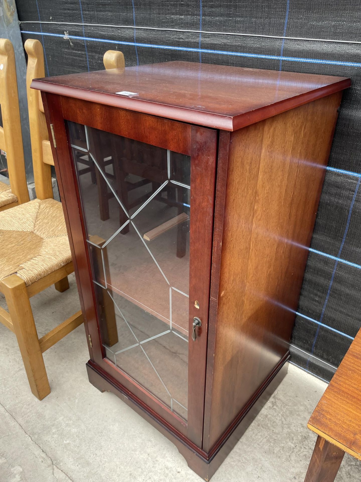 A MODERN MAHOGANY HI-FI CABINET