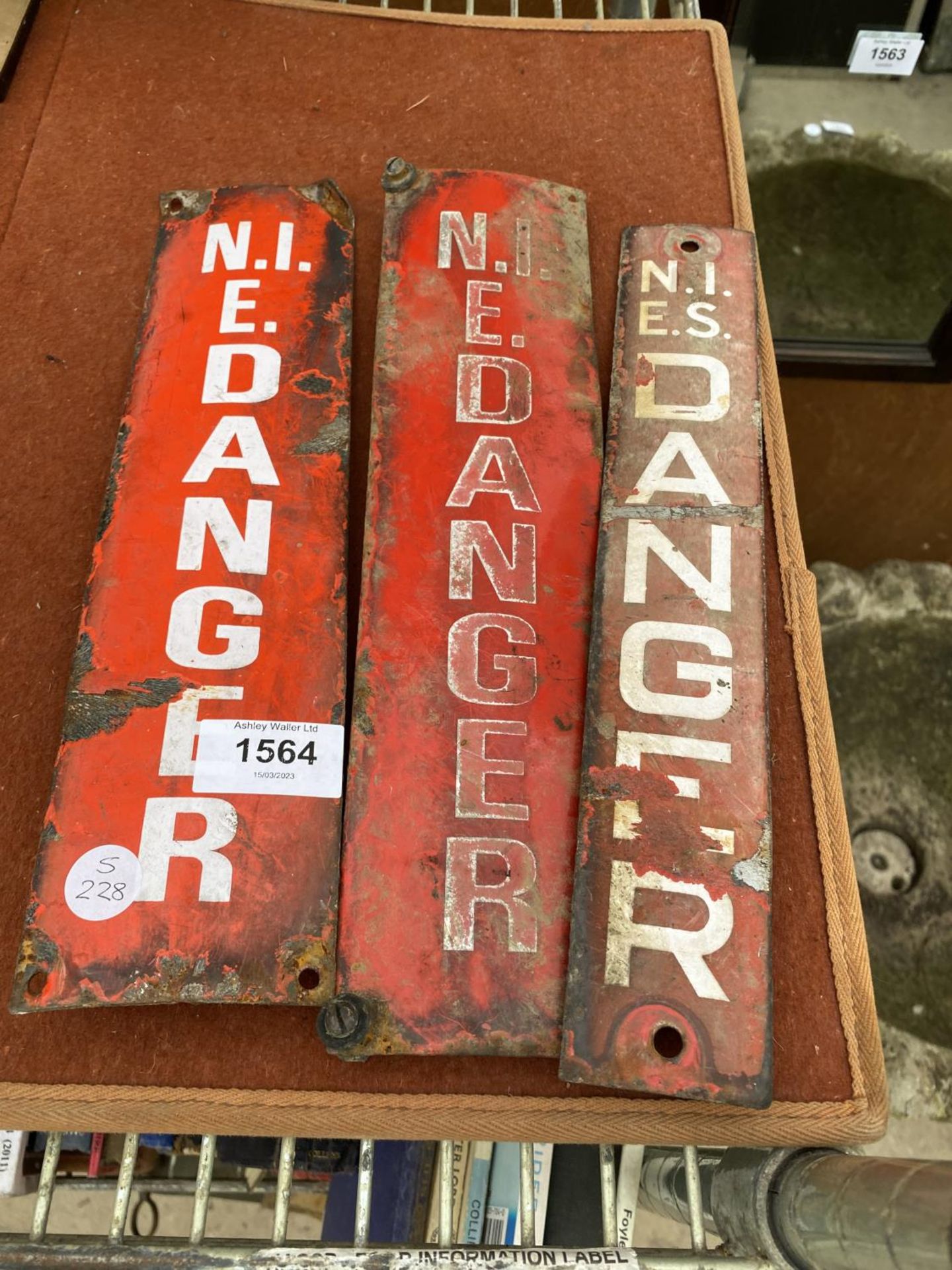 THREE VINTAGE METAL 'N.I.E DANGER' SIGNS