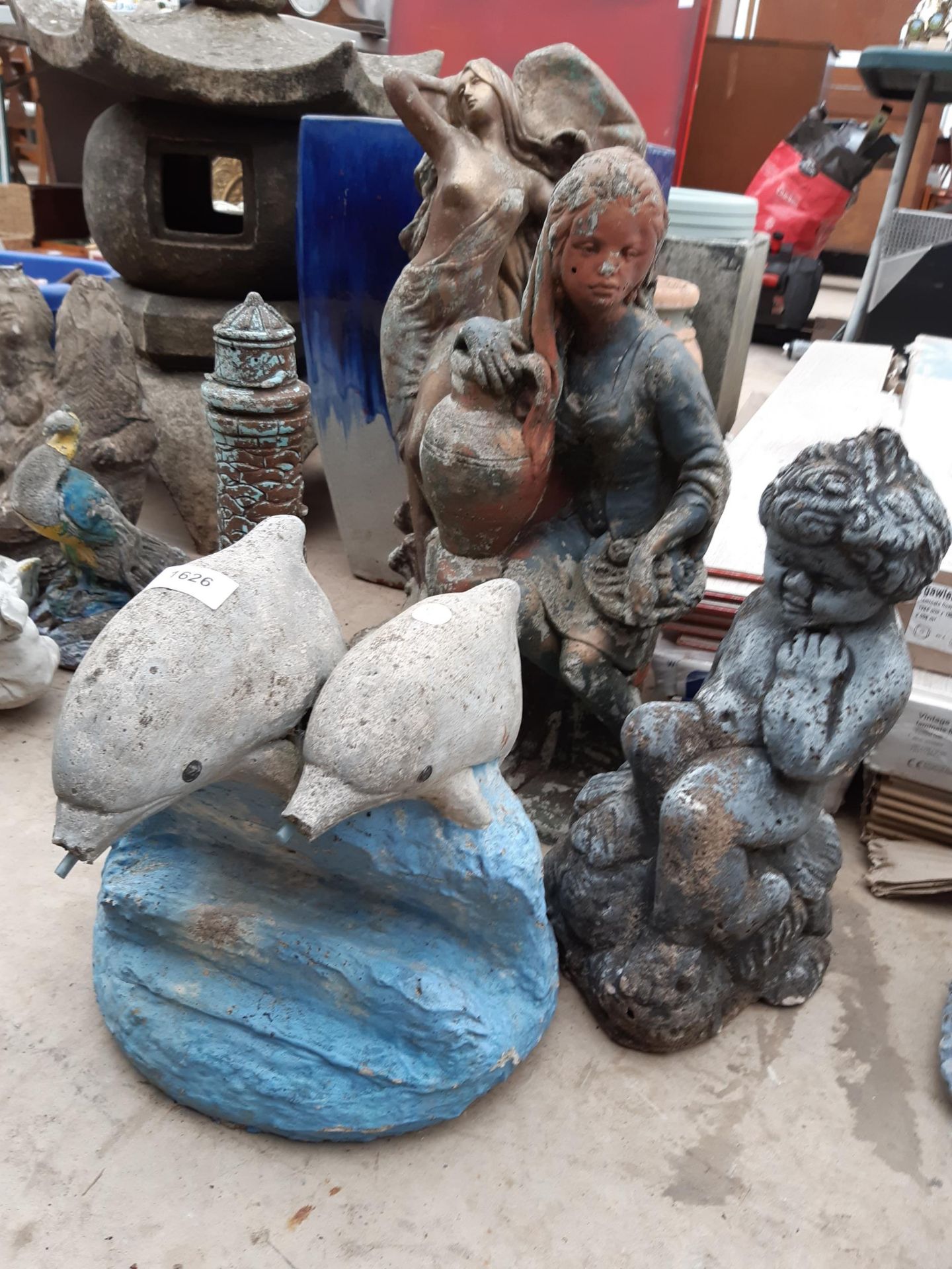 FIVE VARIOUS RECONSTITUTED STONE GARDEN FIGURES TO INCLUDE A LIGHTHOUSE AND DOLPHINS ETC - Image 4 of 4