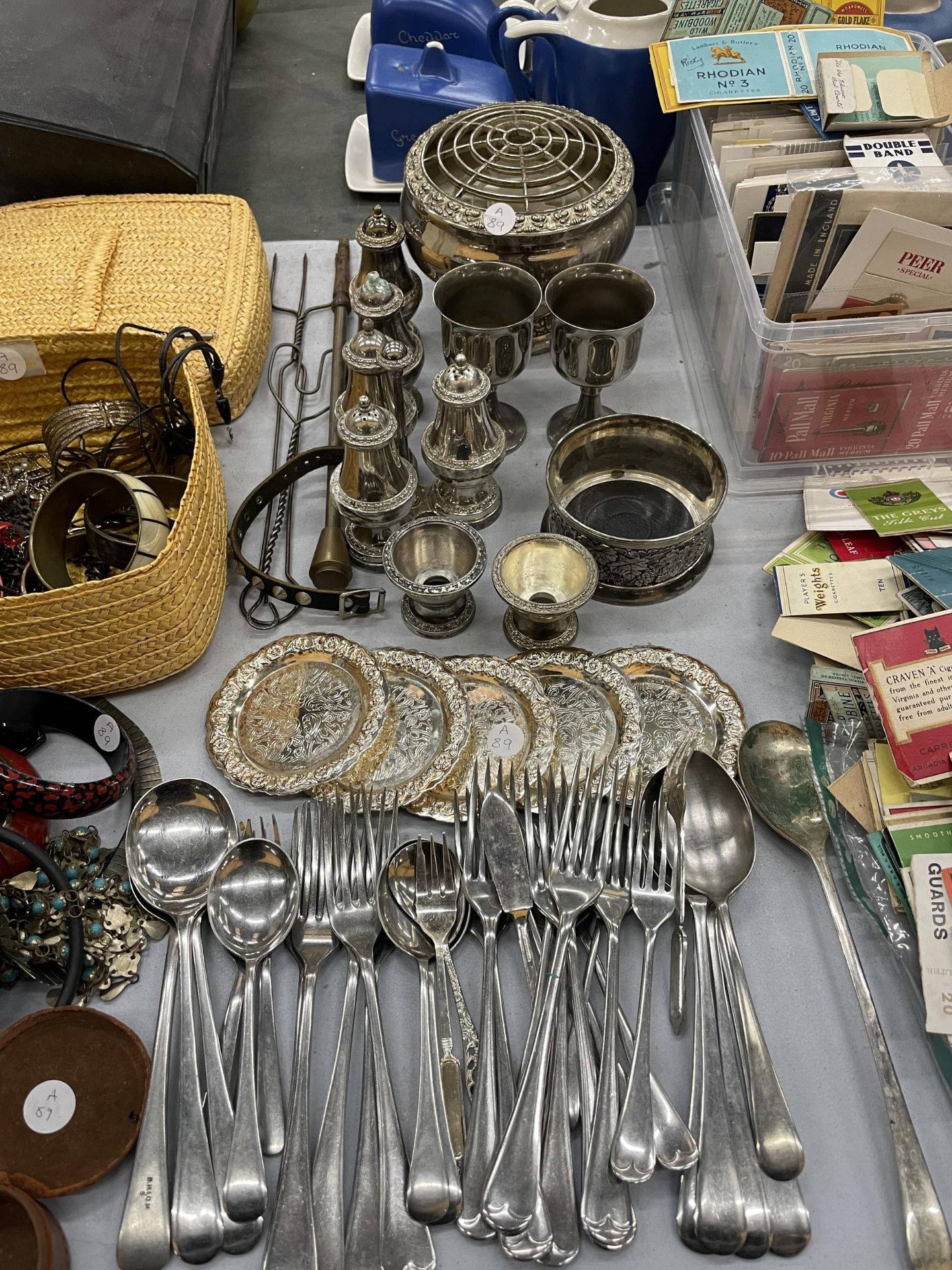 A QUANTITY OF WHITE METAL AND SILVER PLATED ITEMS TO IONCLUDE FLATWARE, CONDIMENTS, BEAKERS, ROSE