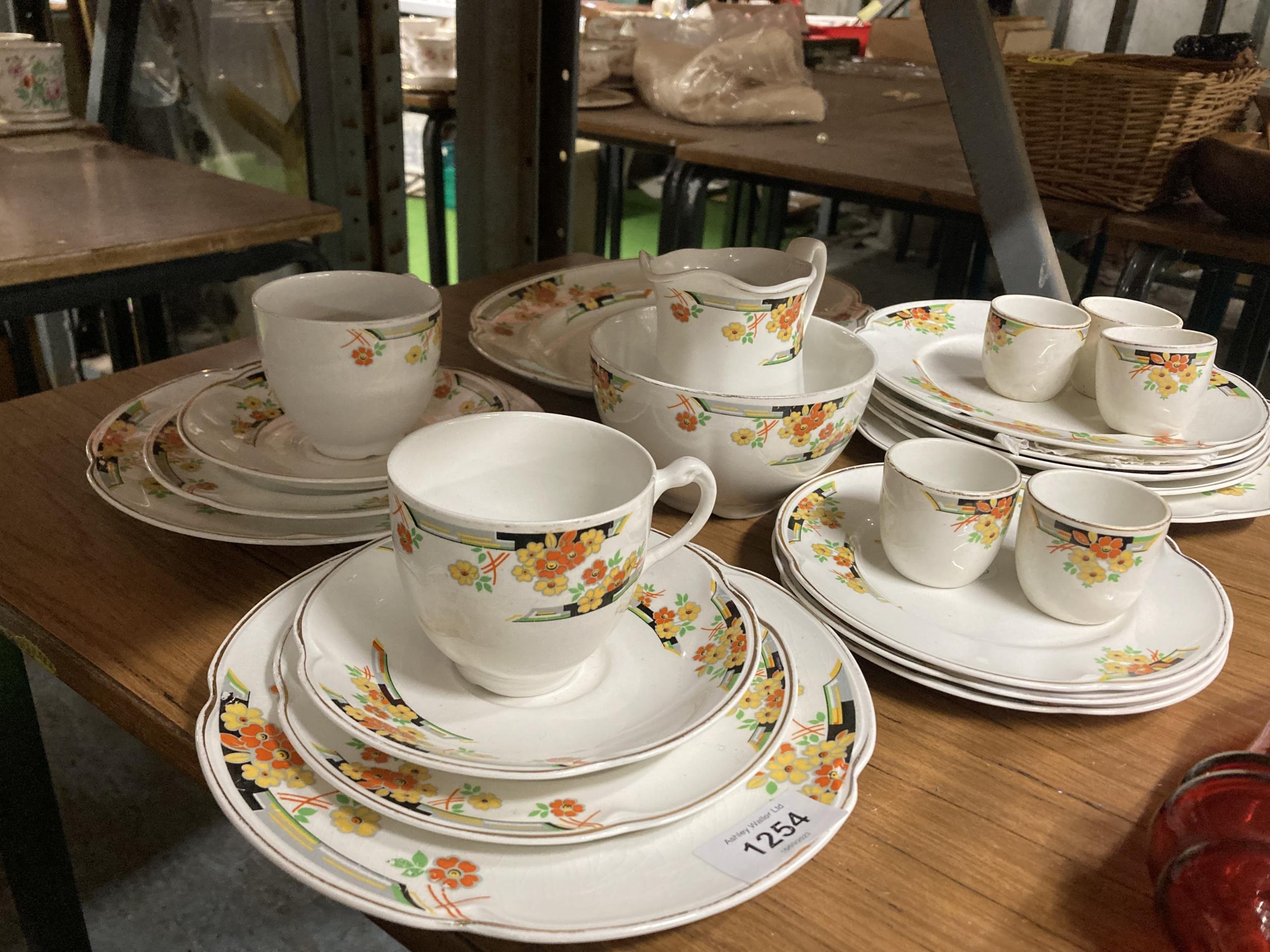 A QUANTITY OF VINTAGE JOHNSON BROS 'FLORIDA' PATTERN TEAWARE TO INCLUDE PLATES, CUPS, SAUCERS, EGG