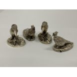 A GROUP OF FOUR HALLMARKED SILVER FILLED CAMELOT SILVERWARE LTD BIRD FIGURES