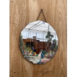 A TWELVE SIDED ART DECO BEVELED EDGE WALL MIRROR WITH NATURE DESIGN