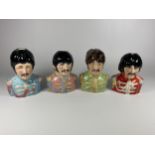 A SET OF FOUR LIMITED EDITION BAIRSTOW MANOR BEATLES JUGS