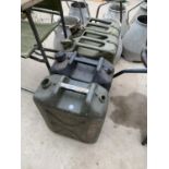 TWO PLASTIC FUEL DRUMS AND TWO VINTAGE METAL JERRY CANS