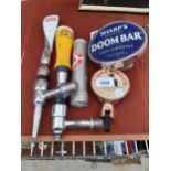 AN ASSORTMENT OF PUB ITEMS TO INCLUDE BEER PUMP HANDLES AND SIGNS ETC