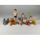 A SET OF EIGHT BESWICK WALT DISNEY WINNIE THE POOH FIGURES