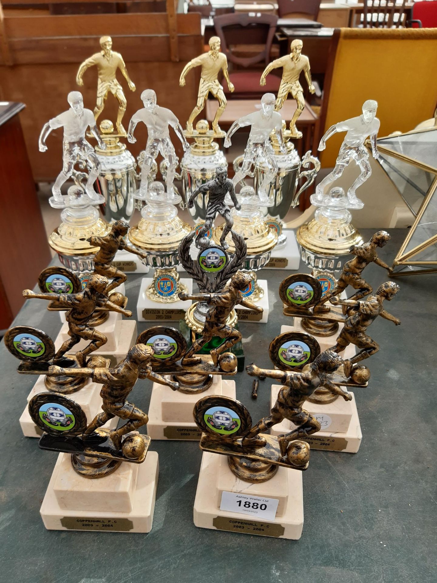 AN ASSORTMENT OF SPORTS TROPHIES